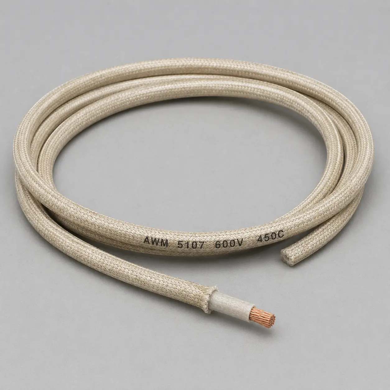UL 5107 mica wire coiled product photo with braided glass outer covering and exposed copper conductor for high-temperature equipment wiring