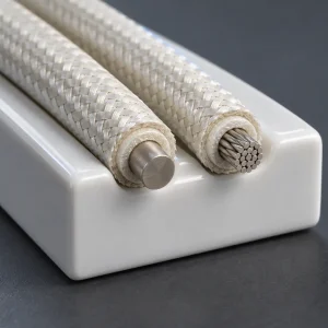 UL 5476 11–4 AWG mica tape wire lengths in a ceramic groove showing solid and stranded conductor ends